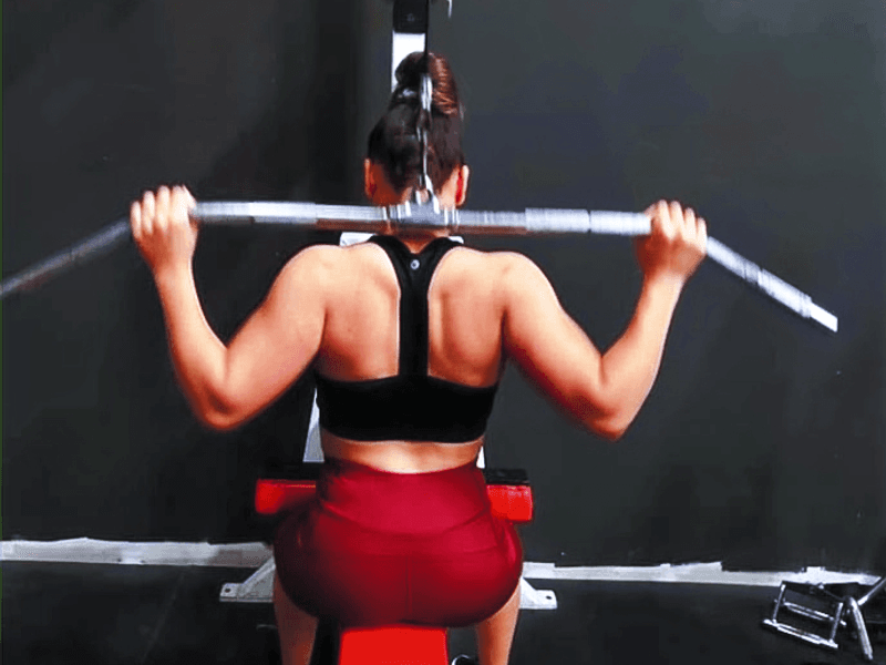 strength training on the barbell at Empire MMA